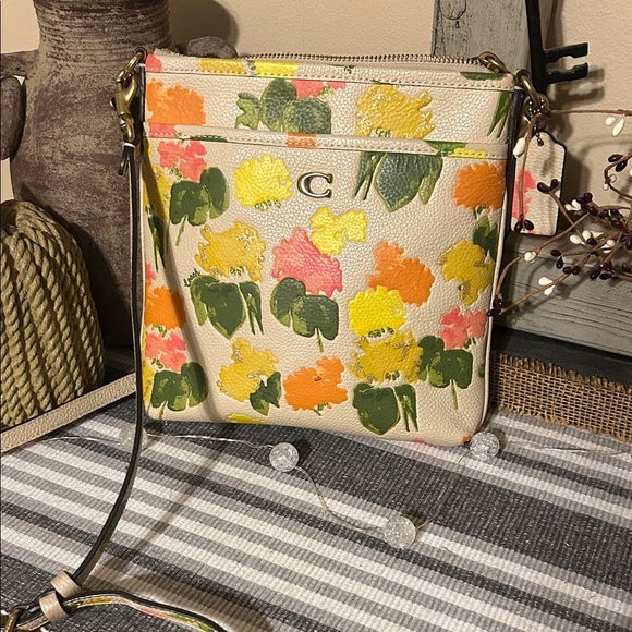 Coach Handbags - Coach Floral Crossbody Bag in Cream and Orange